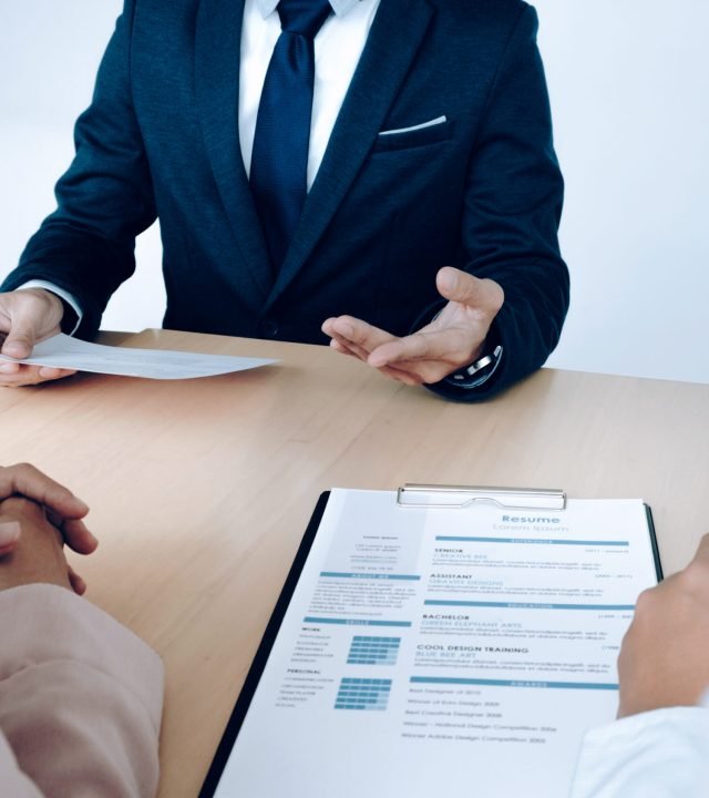 Business situation, job interview concept. Job seeker present resume to managers.